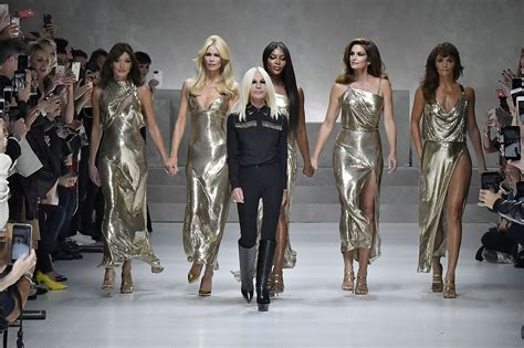 kors buys versace|michael kors acquisition.